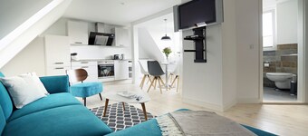 Vacation apartment on the Strelasund 150m to the beach WLAN 250Mbits & e-car connection