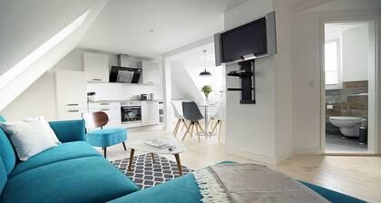 Vacation apartment on the Strelasund 150m to the beach WLAN 250Mbits & e-car connection