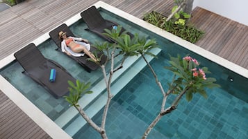 Outdoor pool, sun loungers