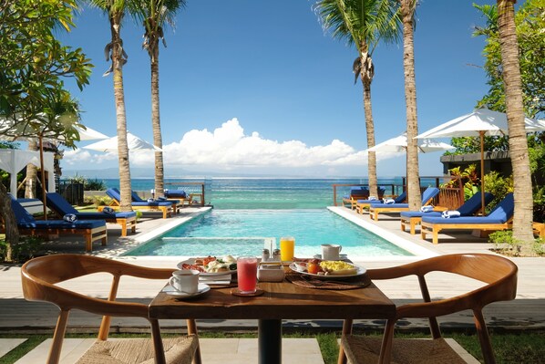 Outdoor pool, pool loungers - Sagara Candidasa by AHM (Karangasem)