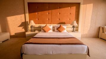 Chambre Double Deluxe, 1 lit double, accessible aux personnes à mobilité réduite | Draps en coton égyptien, literie de qualité supérieure, minibar