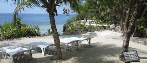 On the beach, kayaking