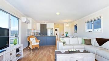 Sunset at Snapper Point | Living area | Flat-screen TV