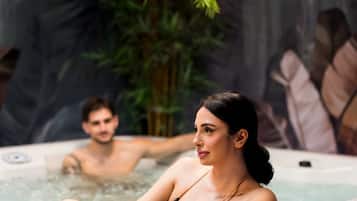 Een sauna, een bubbelbad, een Turks bad/hammam, lichaamsbehandelingen