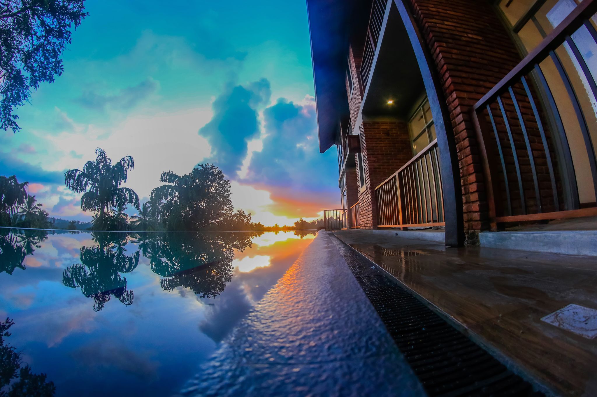 outdoor pool, an infinity pool, pool loungers