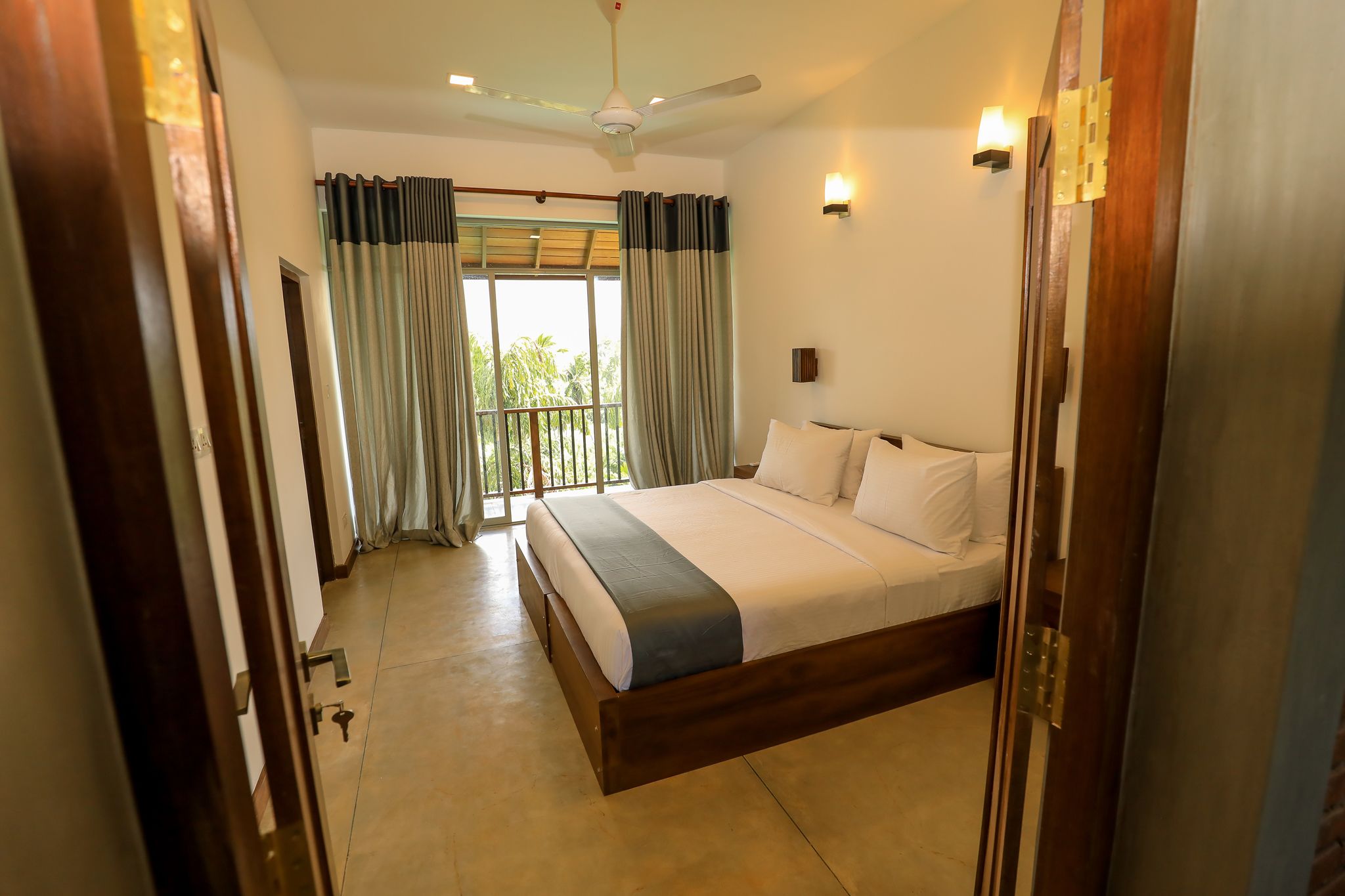deluxe double room, 1 king bed, balcony, pool view | premium bedding, in-room safe, blackout curtains, iron/ironing board