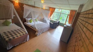 A bedroom with two beds, a small desk, and a window with curtains. - Ayubo Ella - Bed & Breakfast (Ella)
