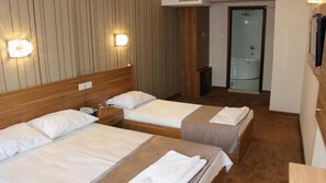 Standard Triple Room | Premium bedding, minibar, in-room safe, free WiFi
