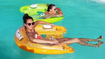 Outdoor pool, pool umbrellas, sun loungers