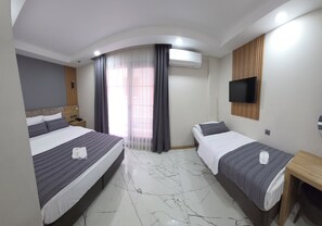 Ropa de cama de alta calidad, minibar y escritorio 