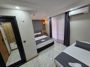 Chambre Triple Économique