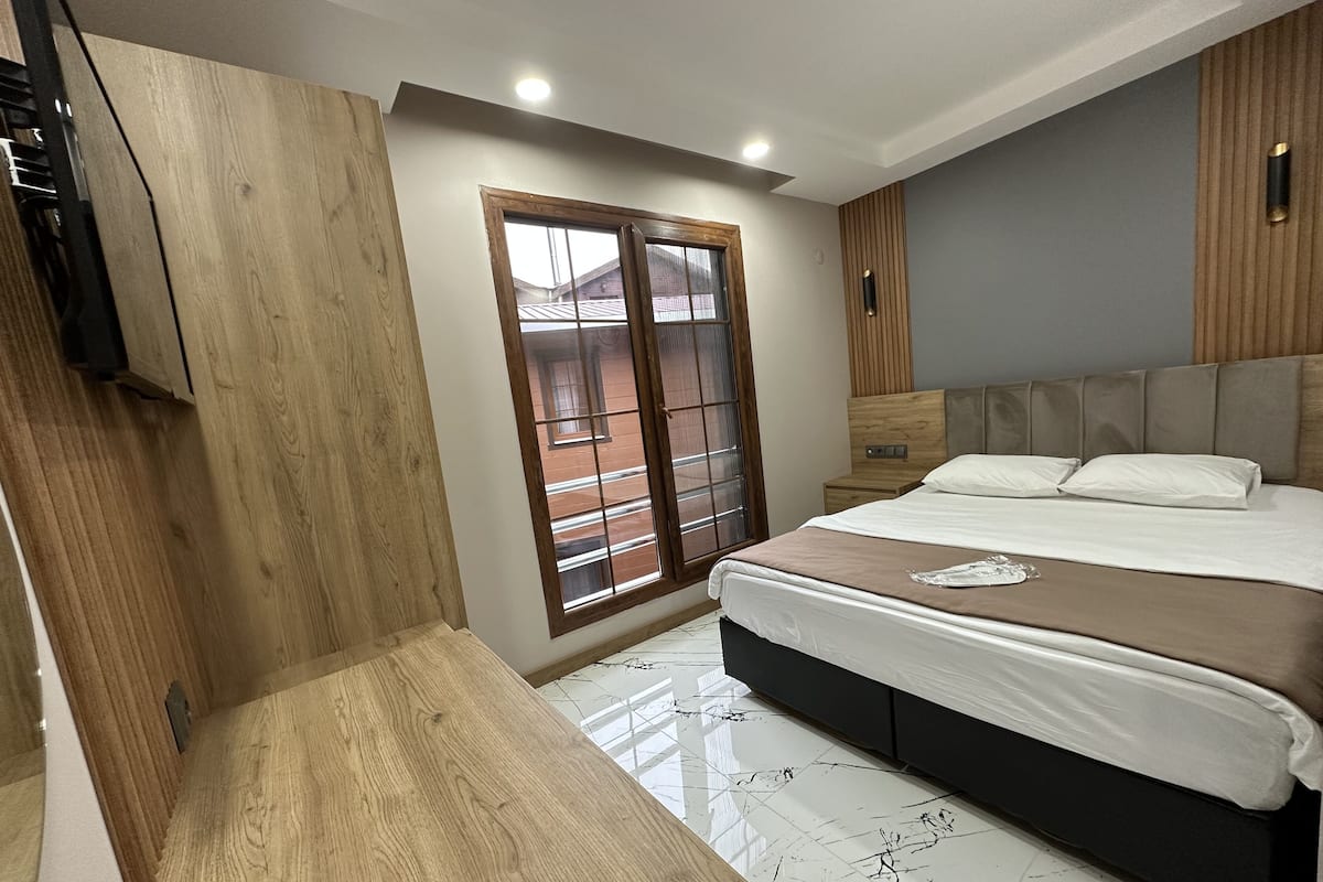 Habitación Deluxe, con acceso para personas discapacitadas, para no fumadores | Ropa de cama de alta calidad, minibar y escritorio