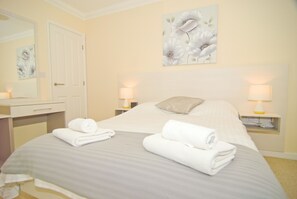 1 bedroom, desk, iron/ironing board, bed sheets