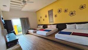A hotel room with two beds, a TV, and a balcony. - MouMoon (Magong)