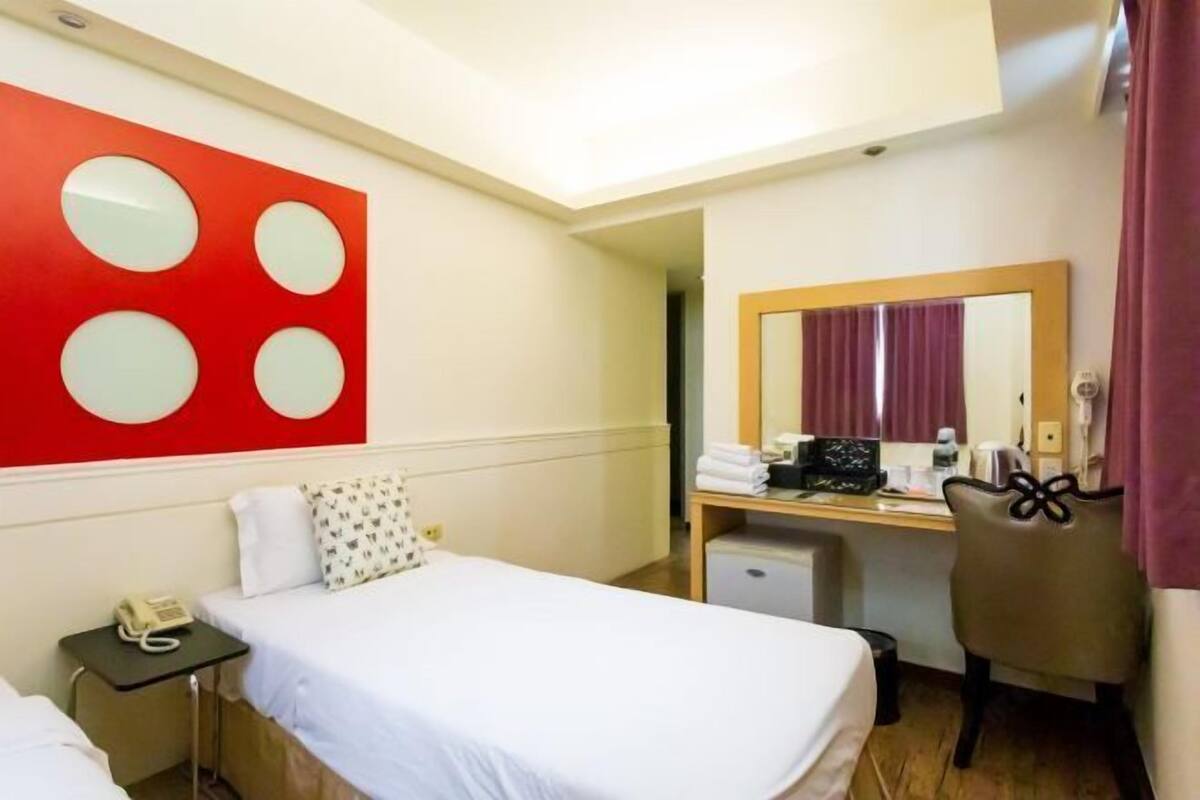 Desk, blackout drapes, soundproofing, free WiFi