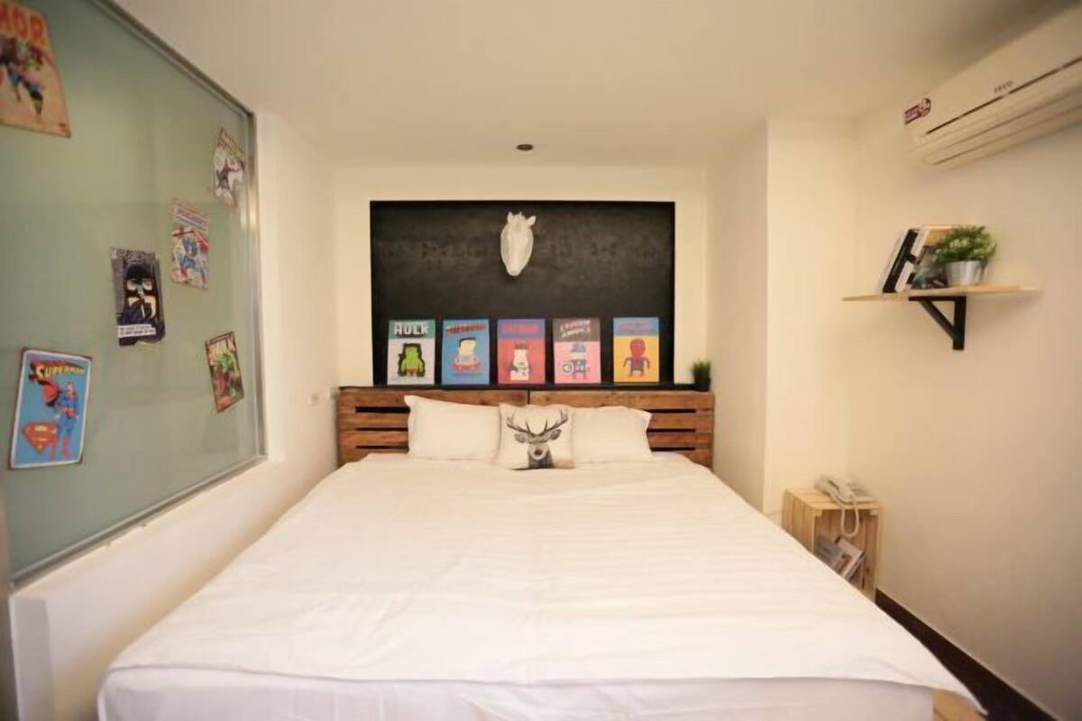 Desk, blackout drapes, soundproofing, free WiFi