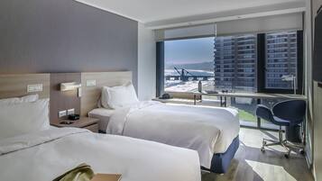 Deluxe Room, 2 Single Beds, Sea View (Top Floor) | Minibar, in-room safe, desk, laptop workspace