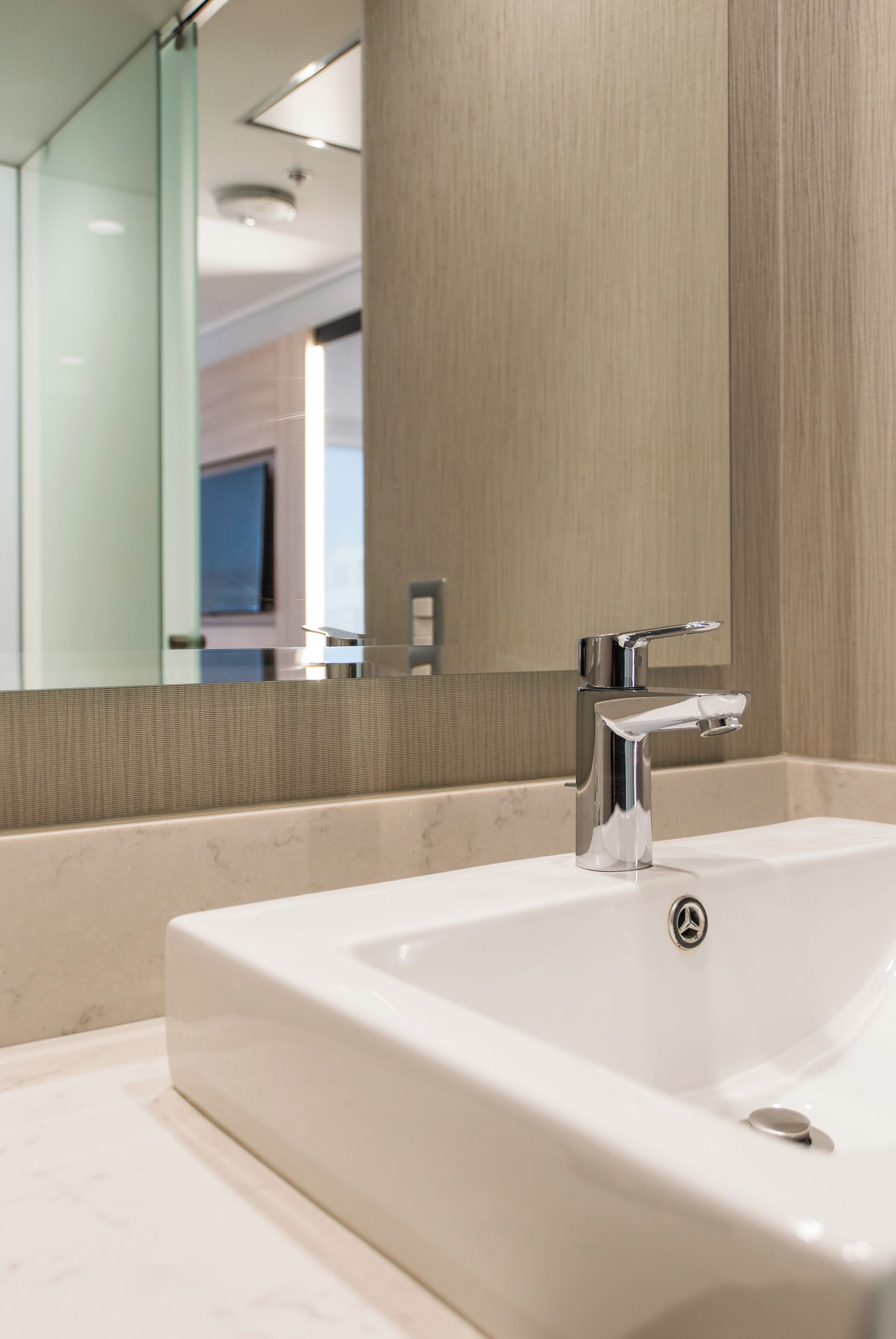 eco-friendly toiletries, hair dryer, slippers, towels