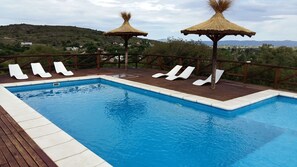2 outdoor pools, pool umbrellas, pool loungers