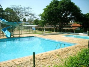 3 outdoor pools, pool umbrellas, pool loungers