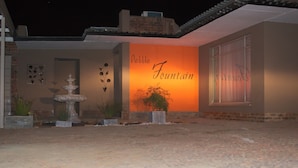 Front of property - evening/night - Pebble Fountain Guesthouse (Bloemfontein)