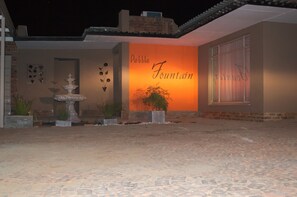 Front of property - evening/night - Pebble Fountain Guesthouse (Bloemfontein)