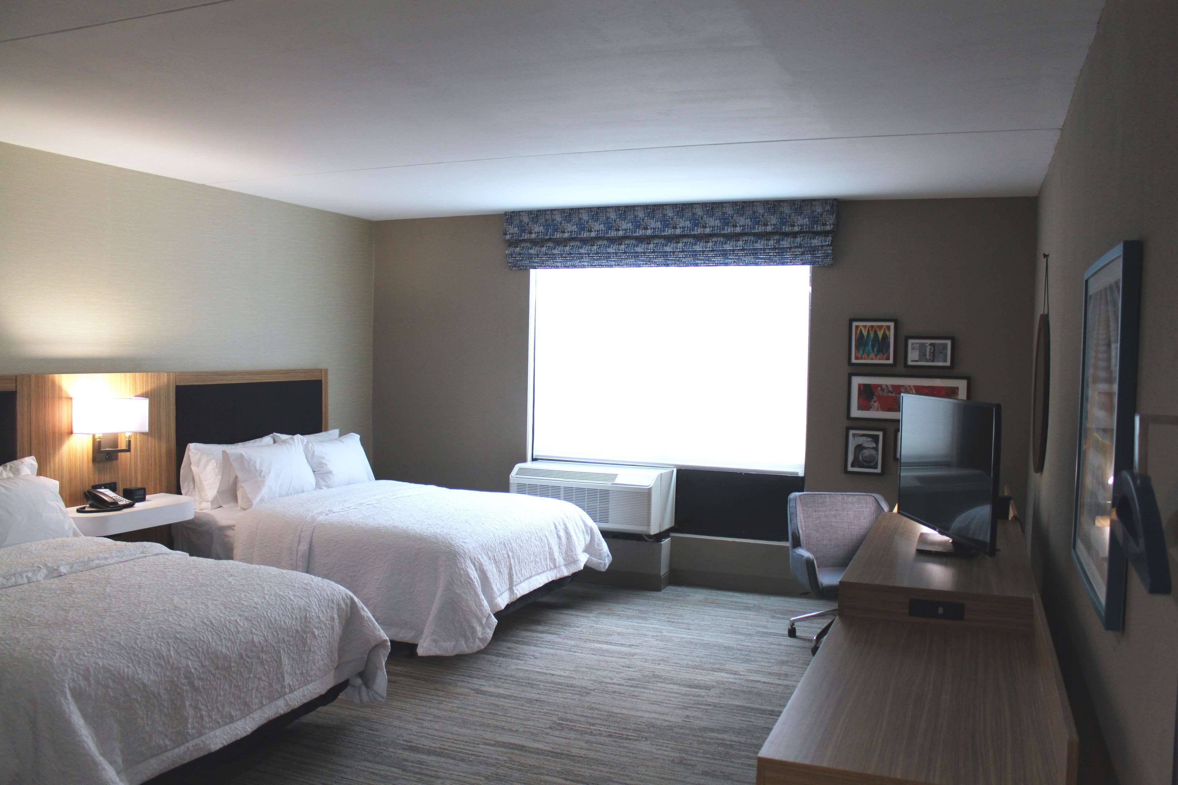 premium bedding, desk, laptop workspace, blackout curtains