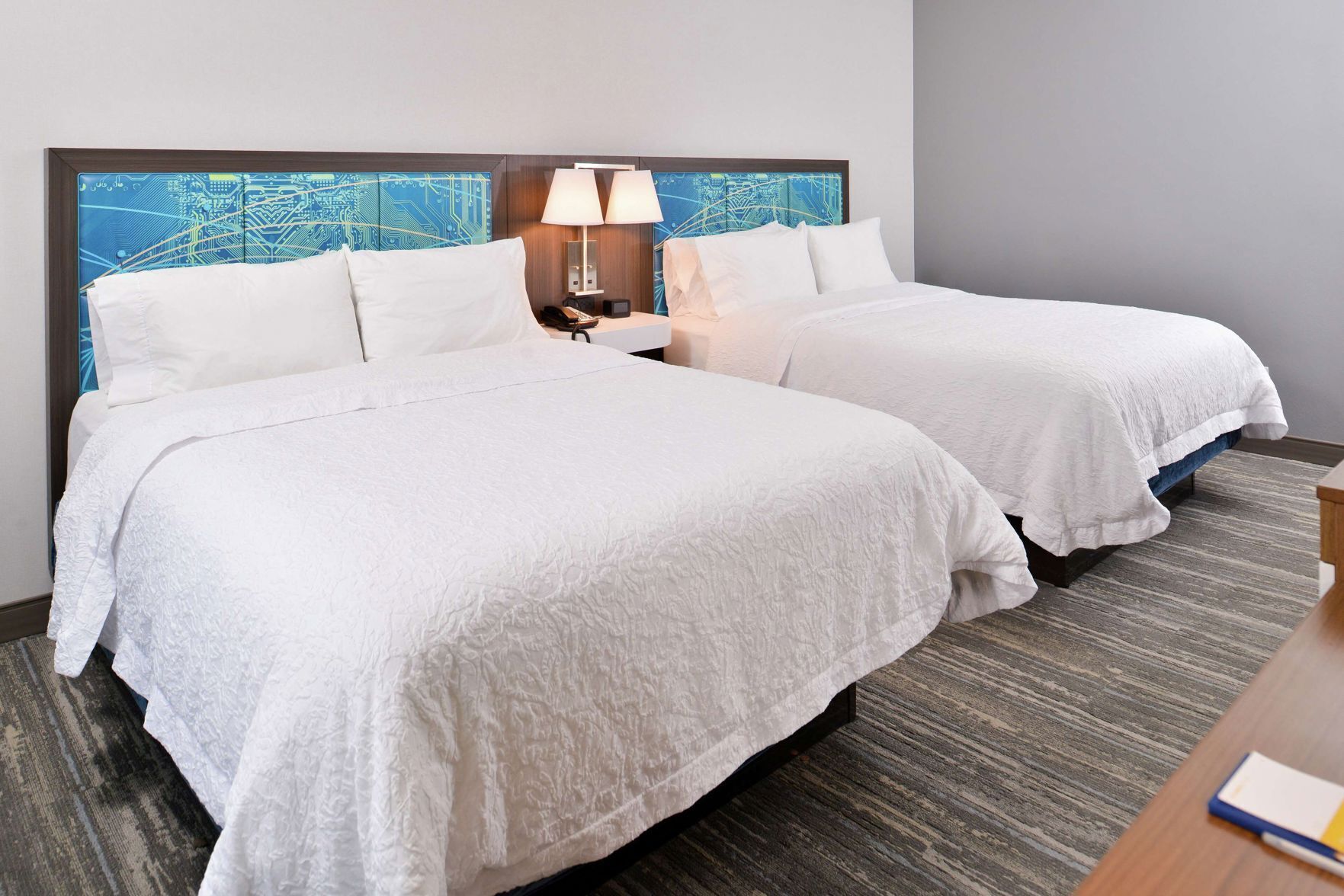 Premium bedding, down comforters, desk, laptop workspace