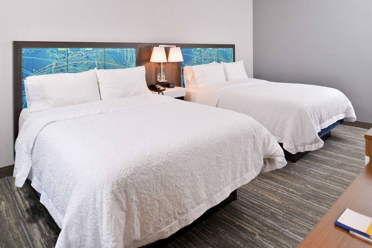 Premium bedding, down comforters, desk, laptop workspace