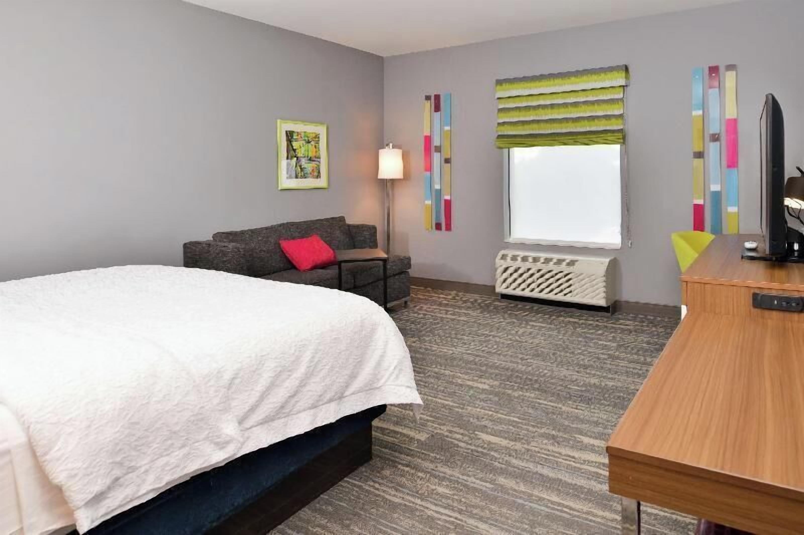 Premium bedding, down comforters, desk, laptop workspace