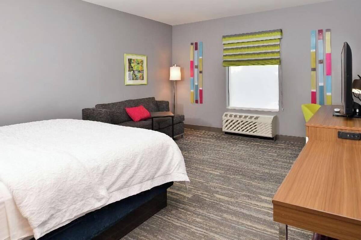 Premium bedding, down comforters, desk, laptop workspace