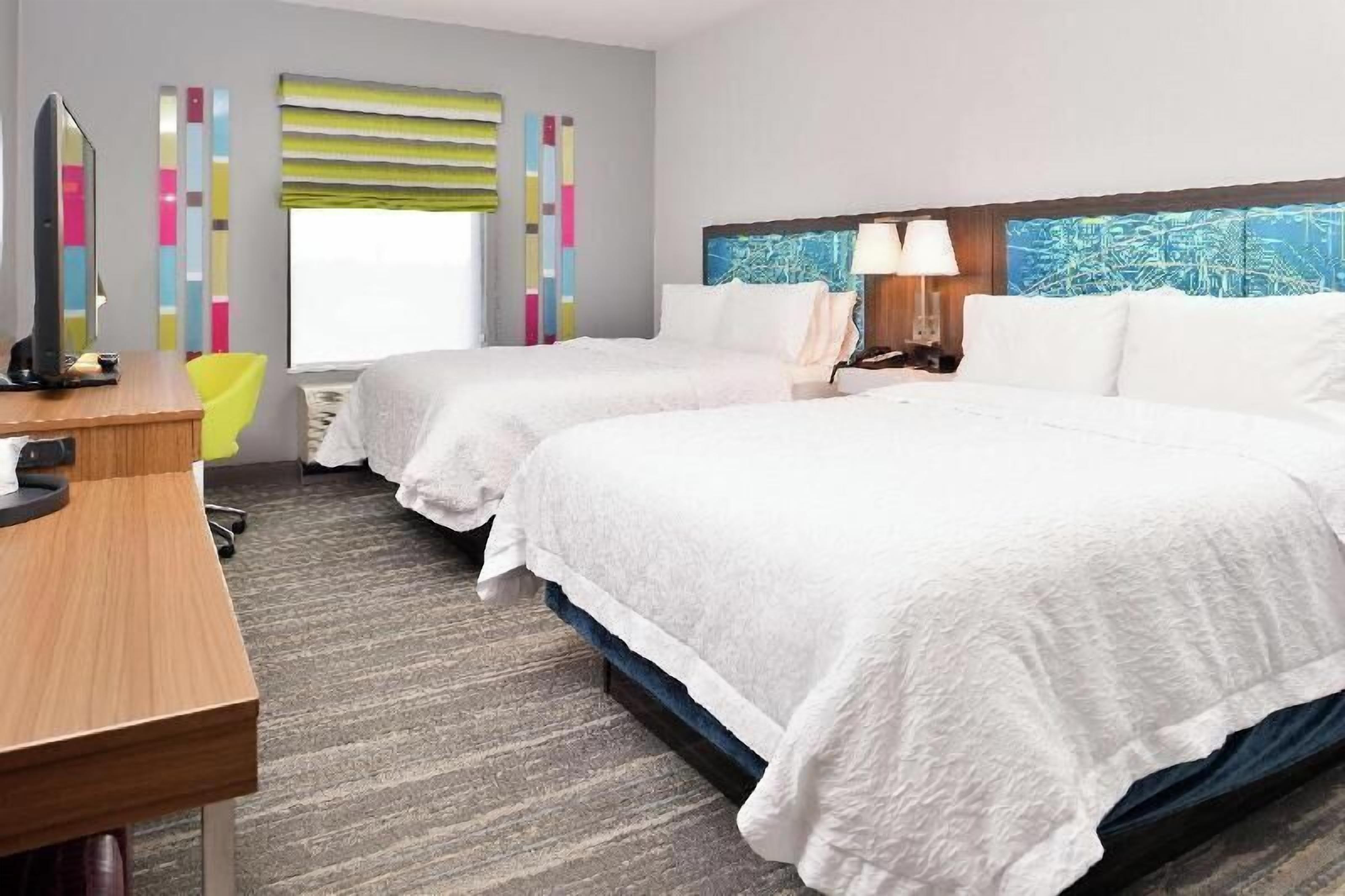 Premium bedding, down comforters, desk, laptop workspace