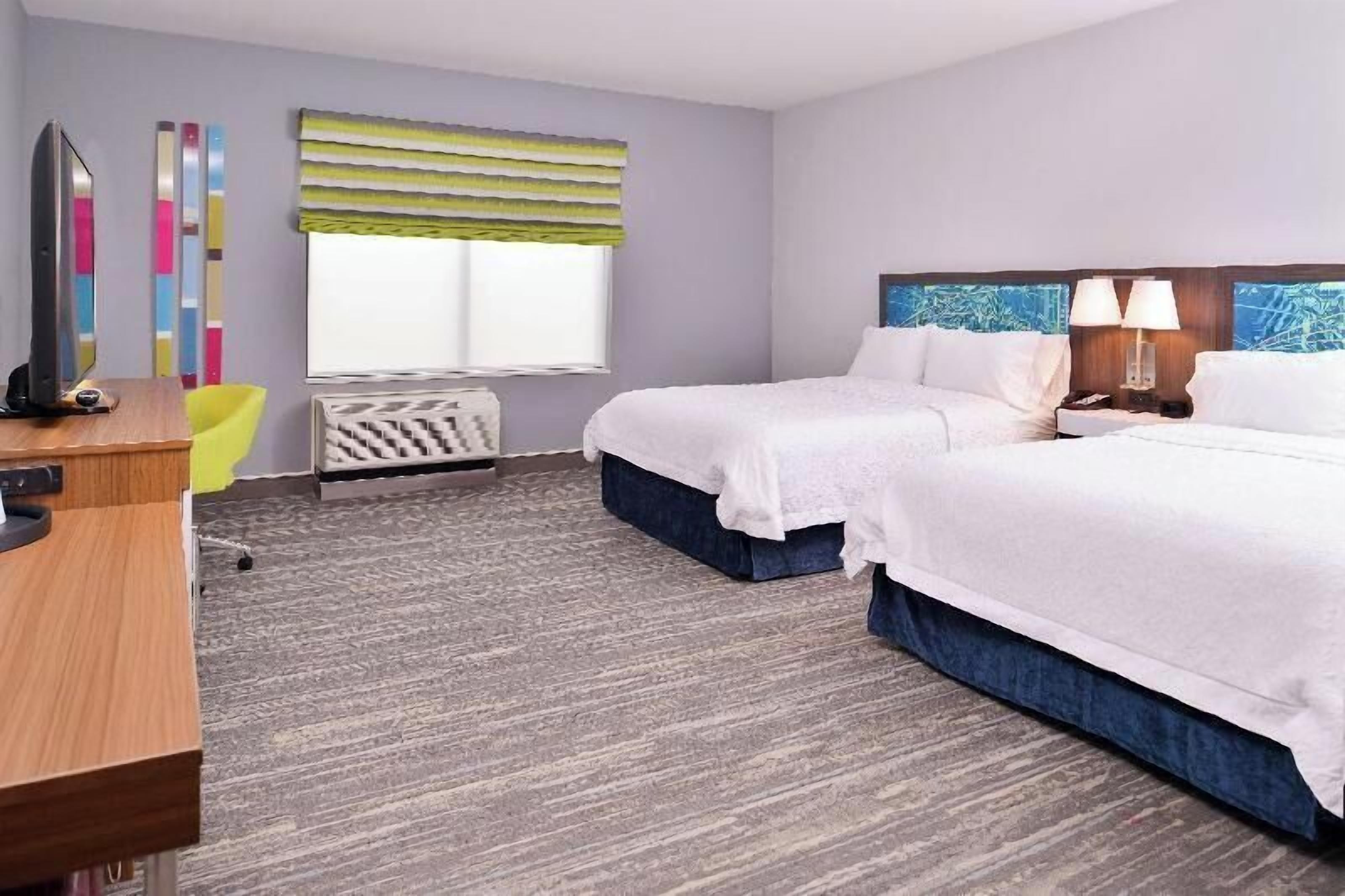 Premium bedding, down comforters, desk, laptop workspace