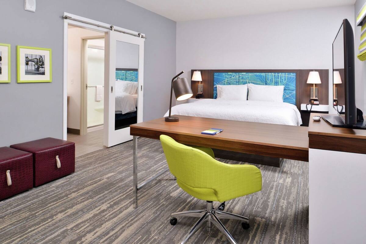 Premium bedding, down comforters, desk, laptop workspace