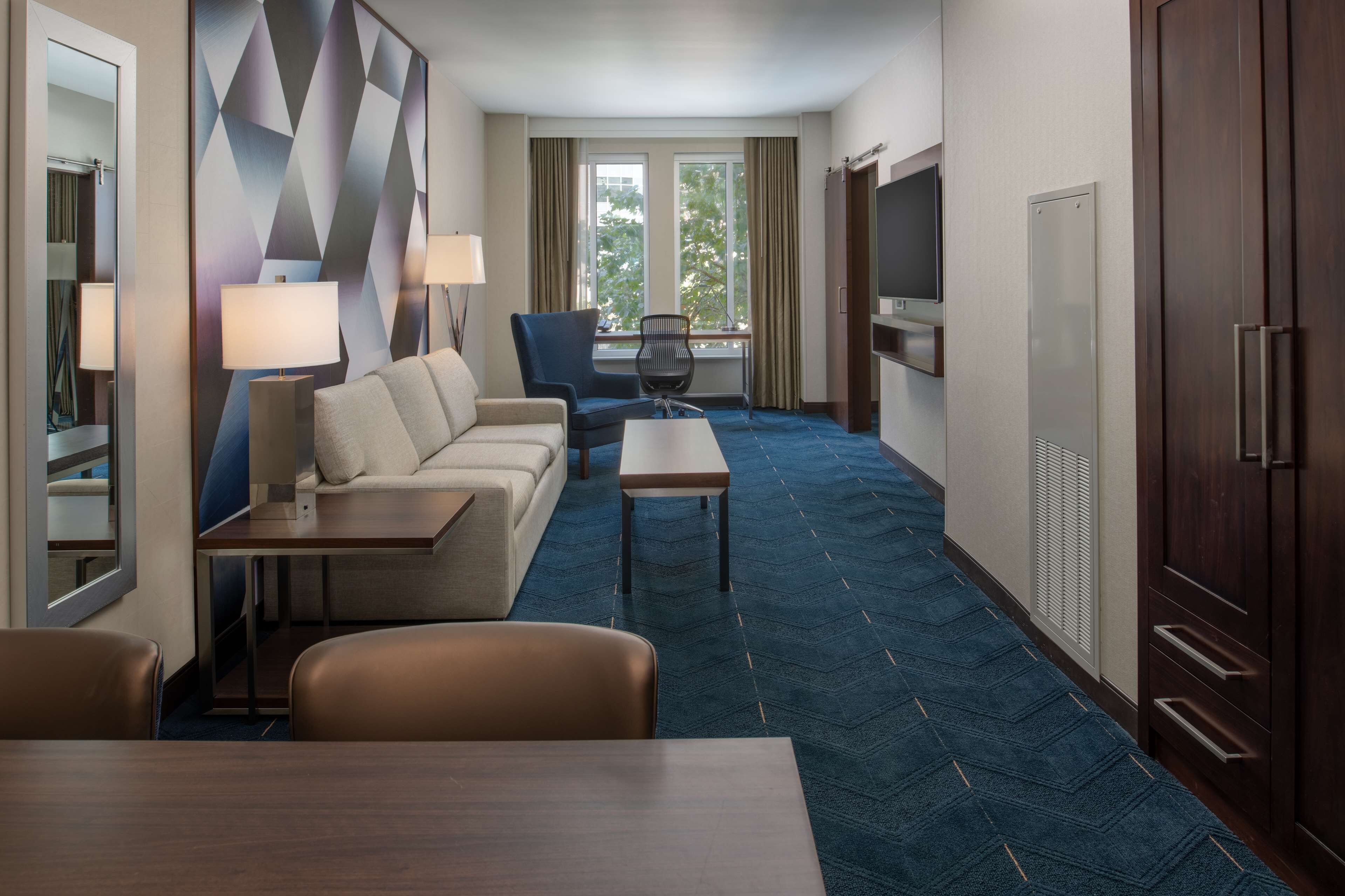 suite, 2 queen beds (oversized) | living area | 50-inch flat-screen tv with premium tv channels, tv, pay films