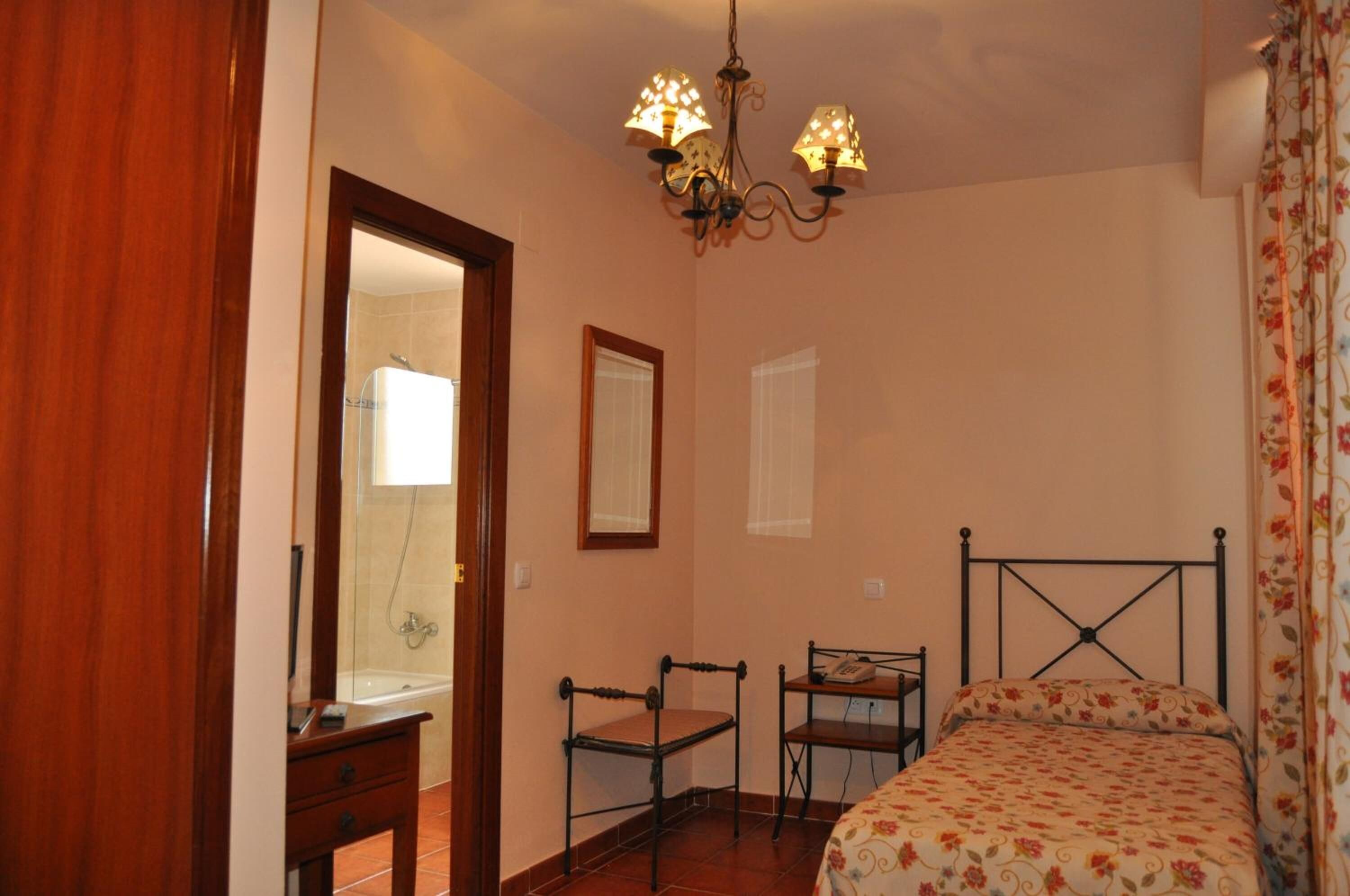 Minibar, desk, blackout drapes, iron/ironing board