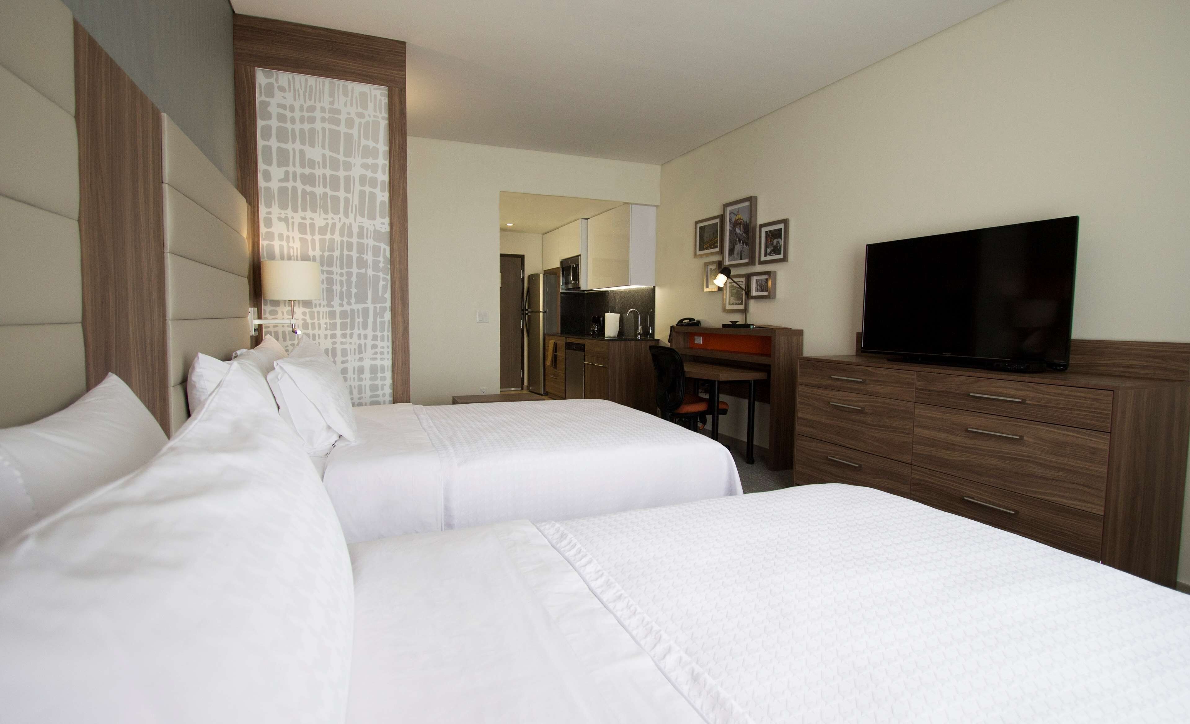 suite, 2 double beds | in-room safe, desk, blackout curtains, soundproofing