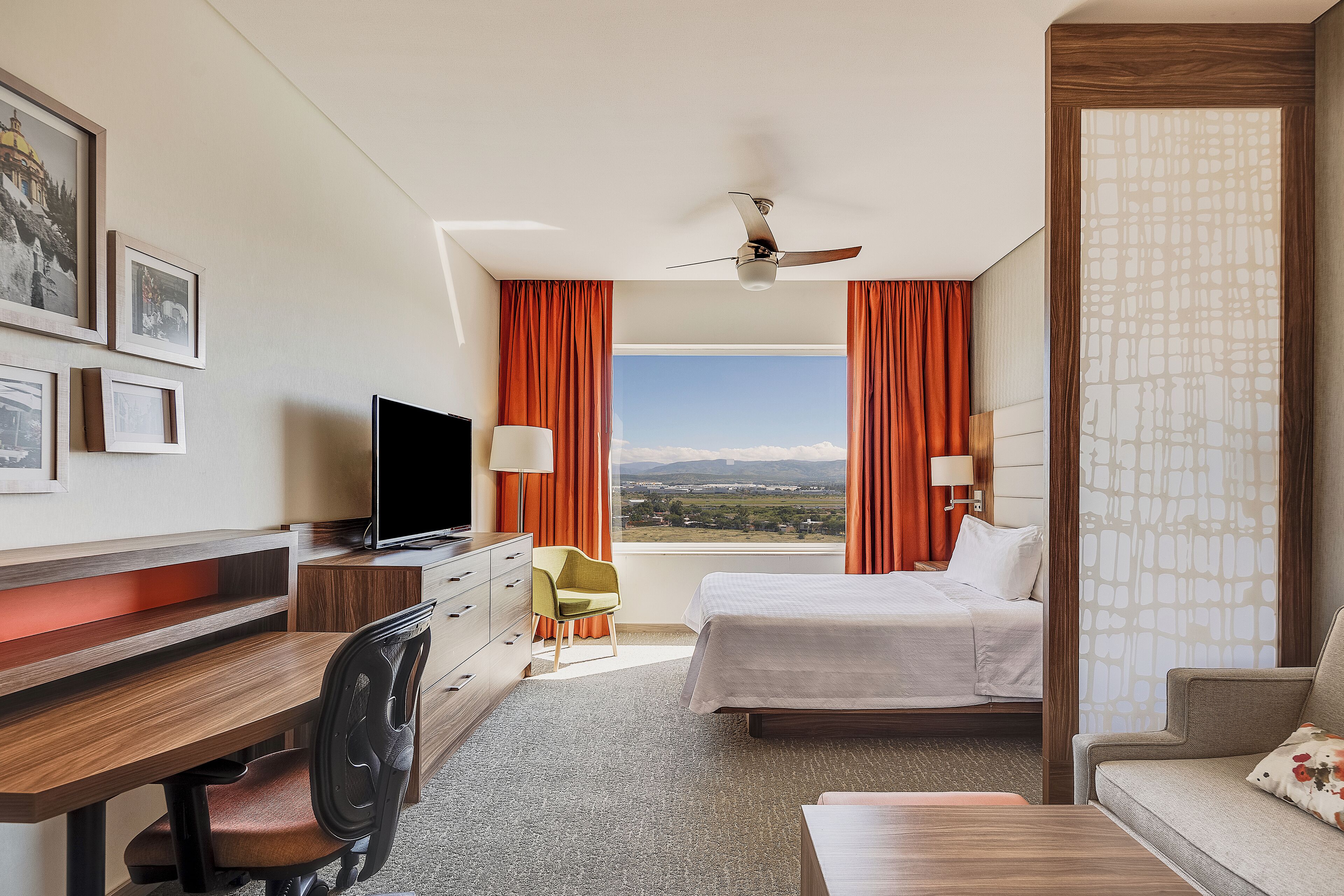 suite, 1 queen bed | in-room safe, desk, blackout curtains, soundproofing
