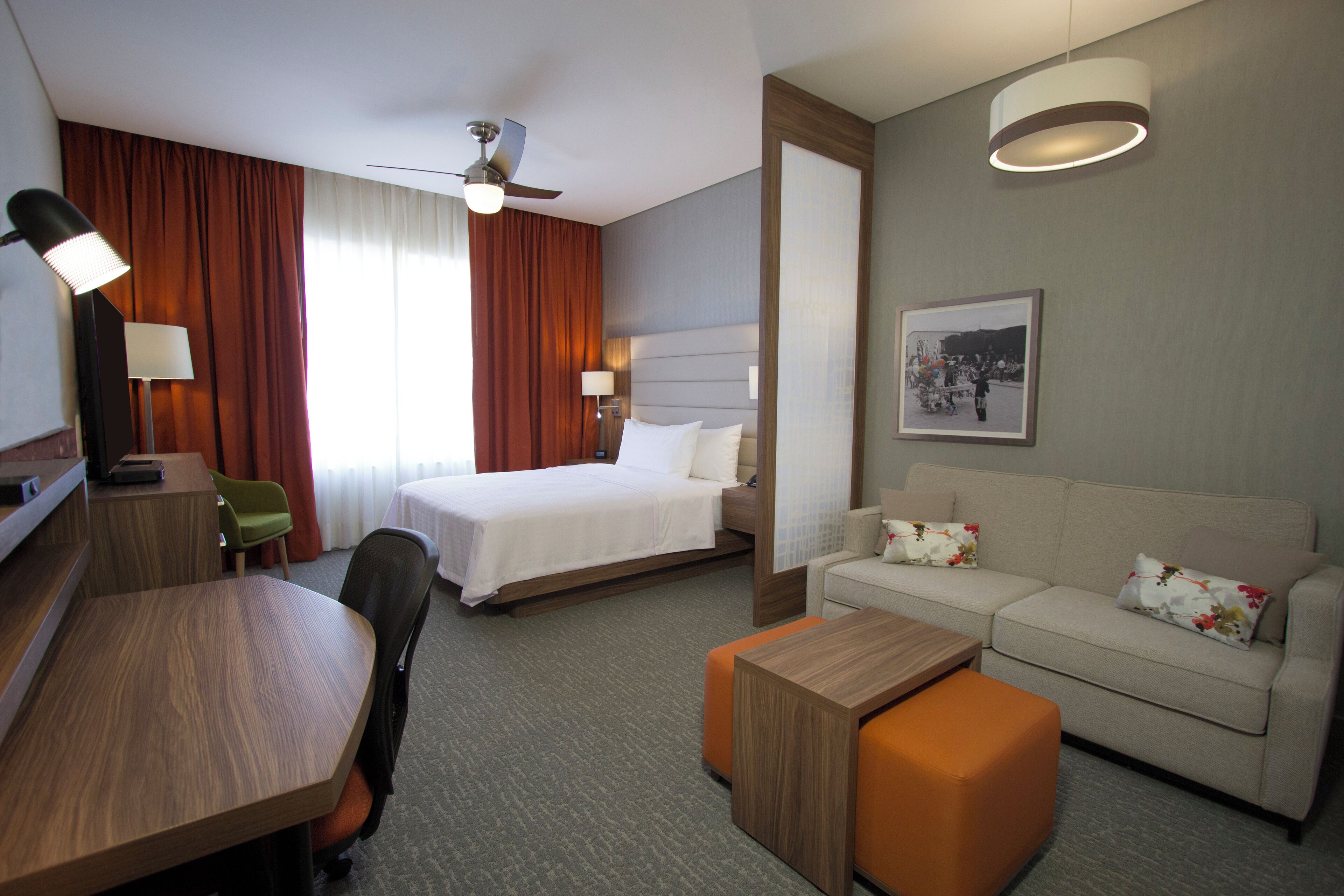 suite, 1 queen bed | in-room safe, desk, blackout curtains, soundproofing