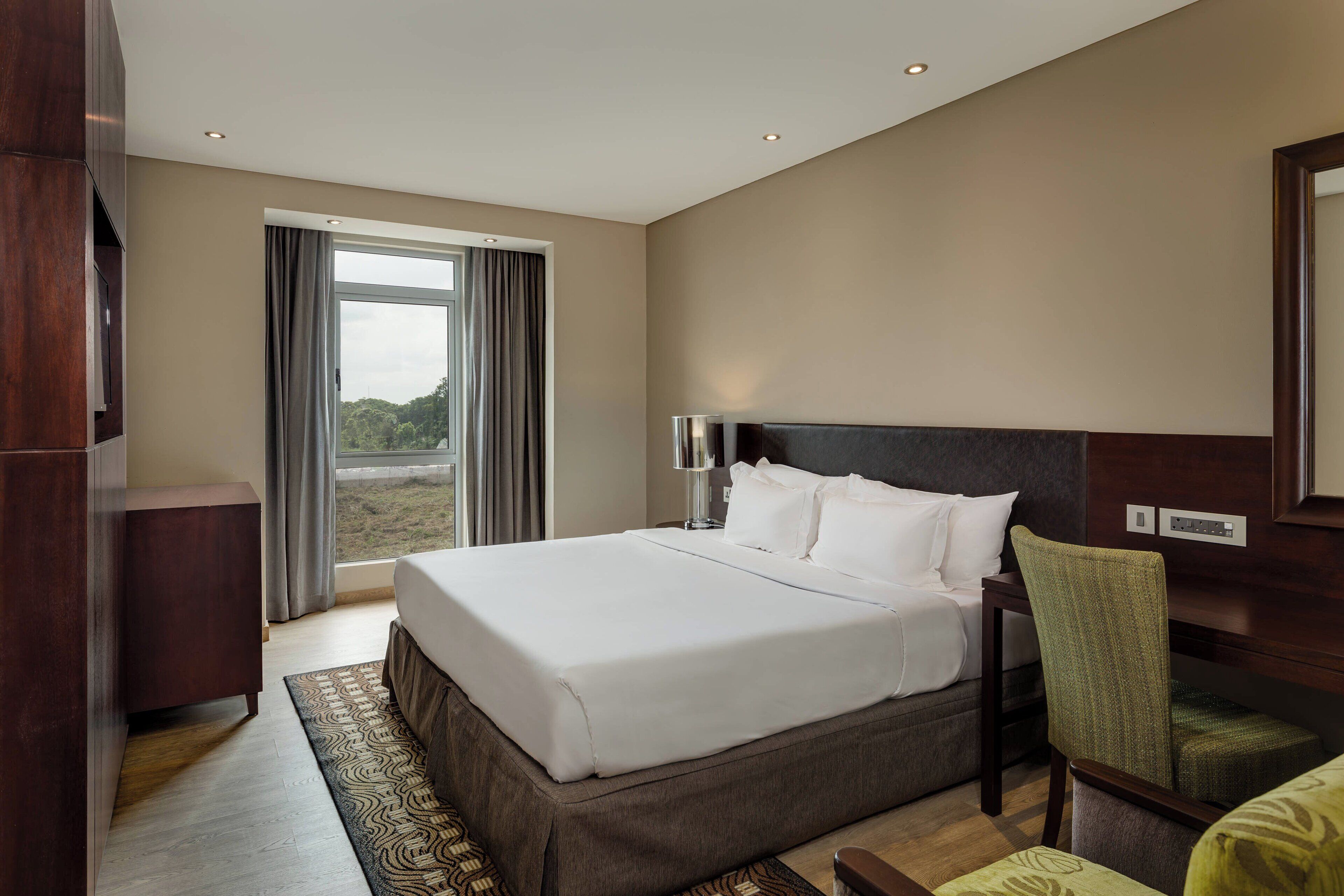 Quarto luxo, 1 cama King | Vista para o jardim