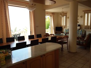 Panoramic Villa, Sea View | Living area | Flat-screen TV, fireplace, DVD player, books - Where The Gods Live (Pegeia)