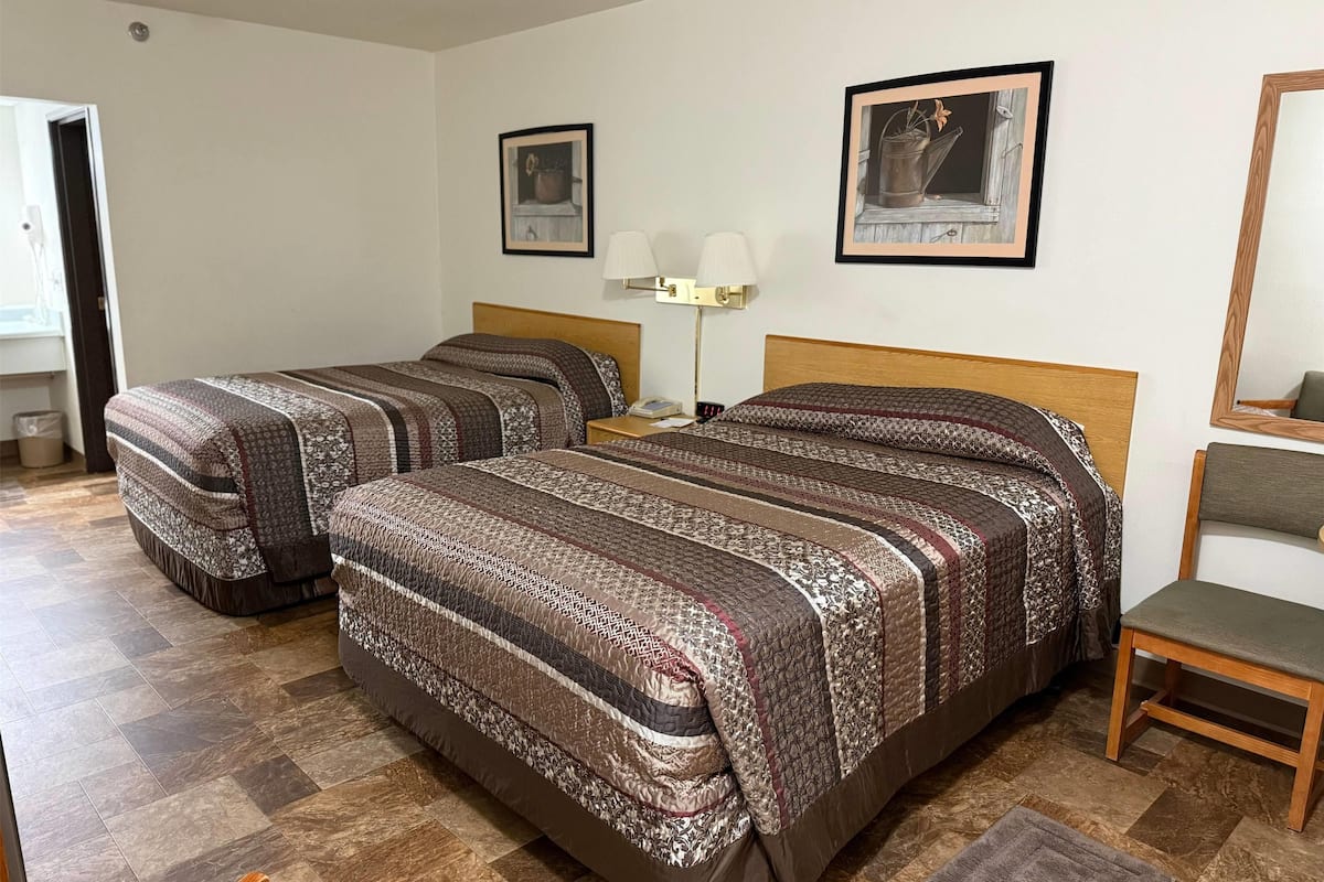 Room, 2 Queen Beds, Non Smoking (Pet-Friendly) | Desk, blackout drapes, iron/ironing board, free cribs/infant beds