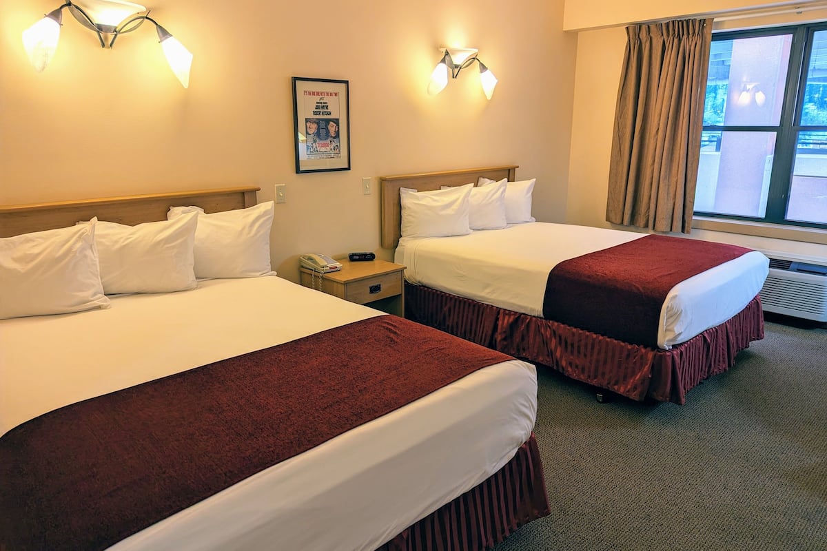 Room, 2 Queen Beds, Non Smoking (Non Pet-Friendly) | Desk, blackout drapes, iron/ironing board, free cribs/infant beds