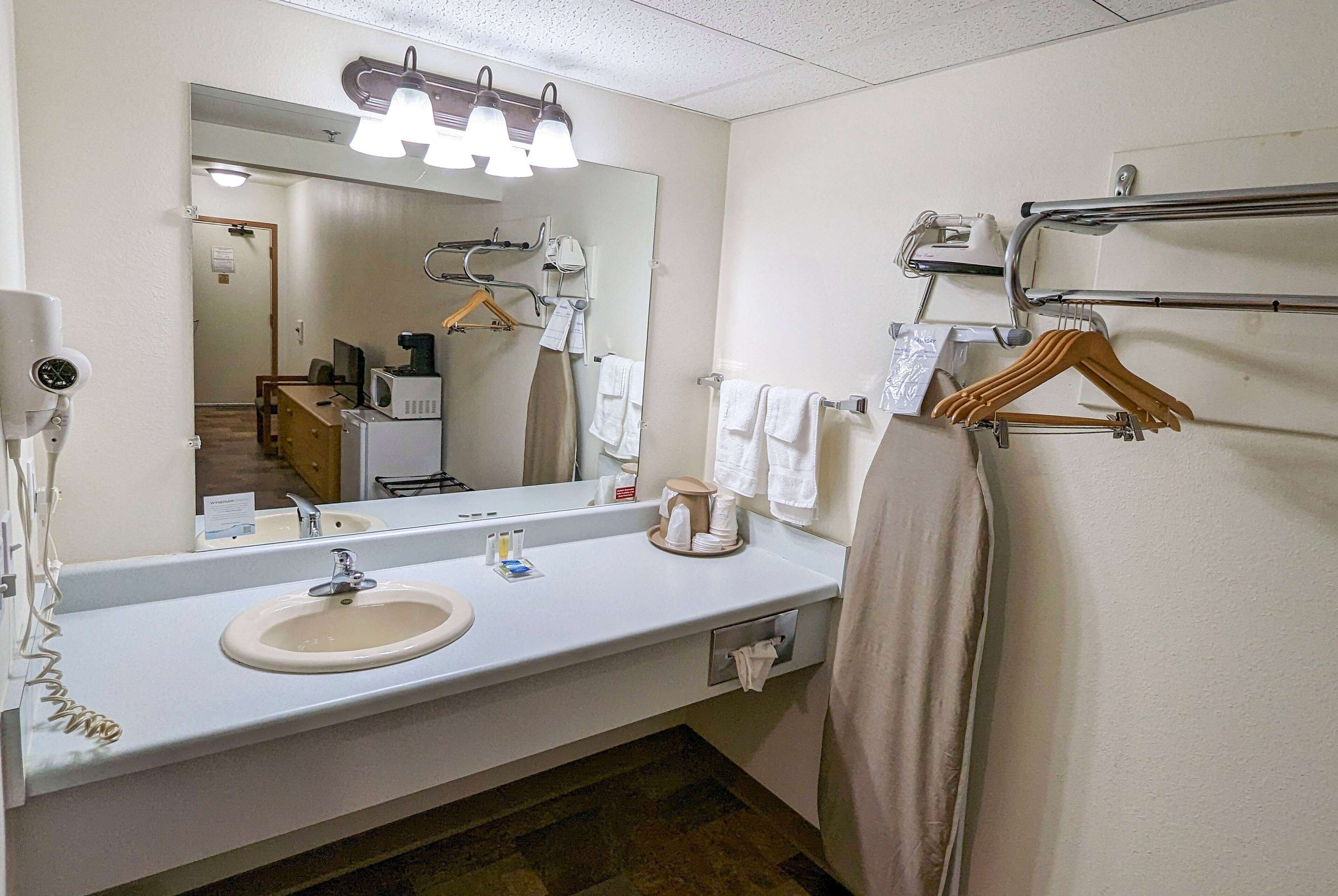 desk, blackout curtains, iron/ironing board, free cots/infant beds