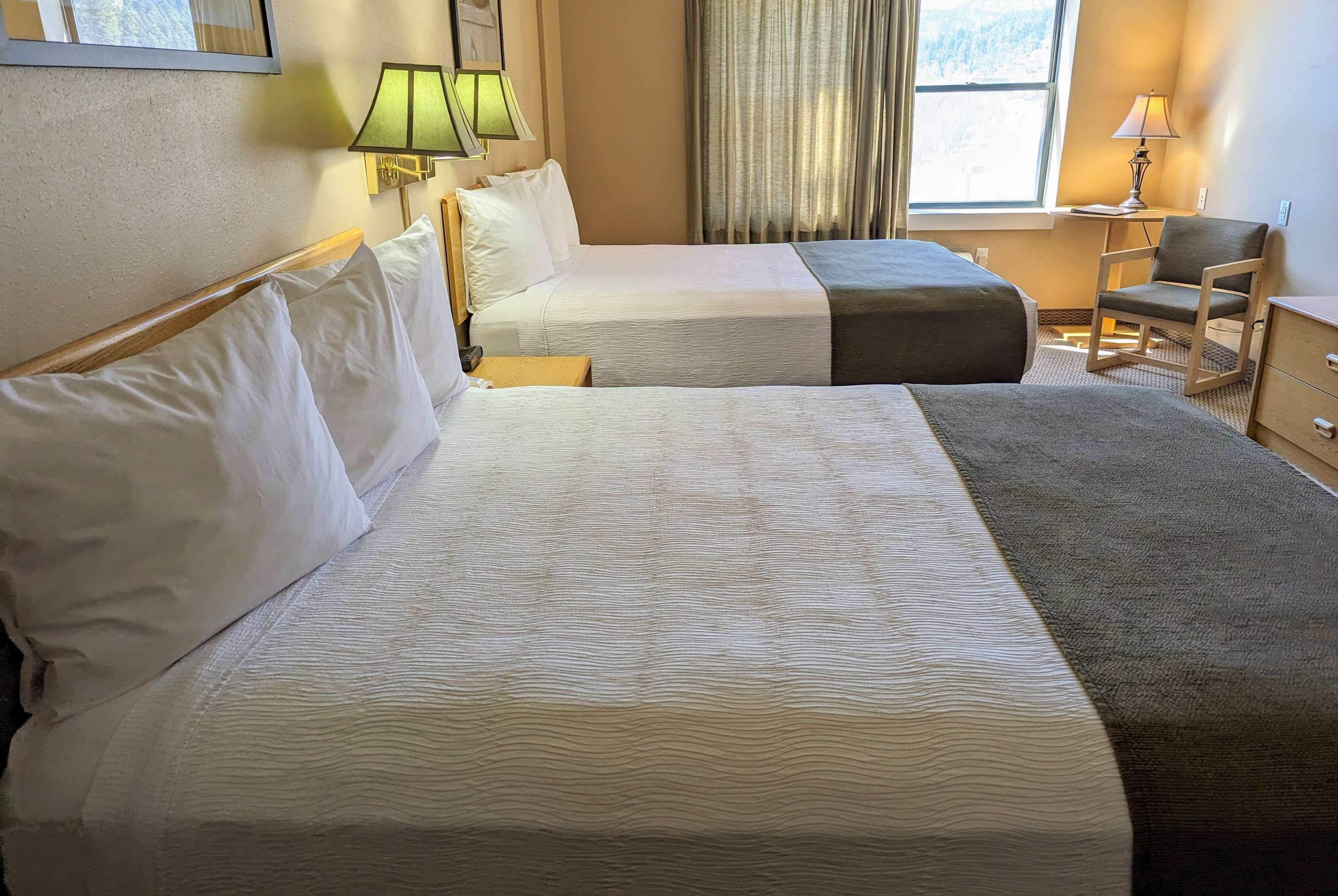 room, 2 queen beds, non smoking (non pet-friendly) | desk, blackout curtains, iron/ironing board, free cots/infant beds