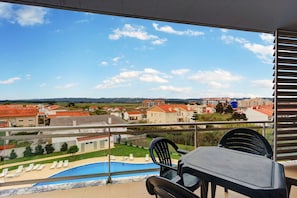 Pool view from rear balcony. Enjoy a glass of wine and keep an eye on the kids!