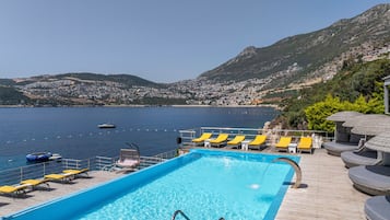 Outdoor pool, pool umbrellas, pool loungers