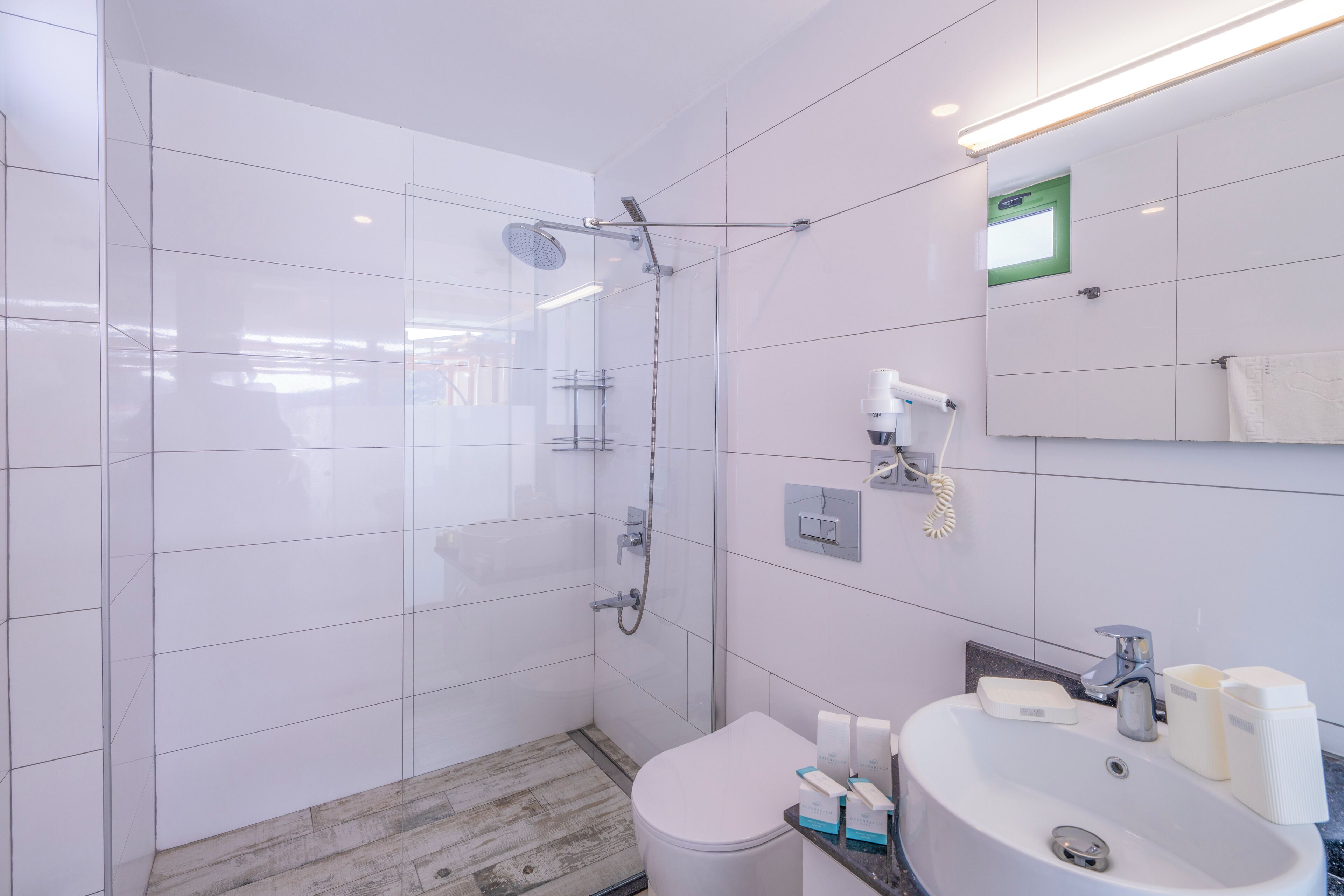 shower, free toiletries, hair dryer, towels