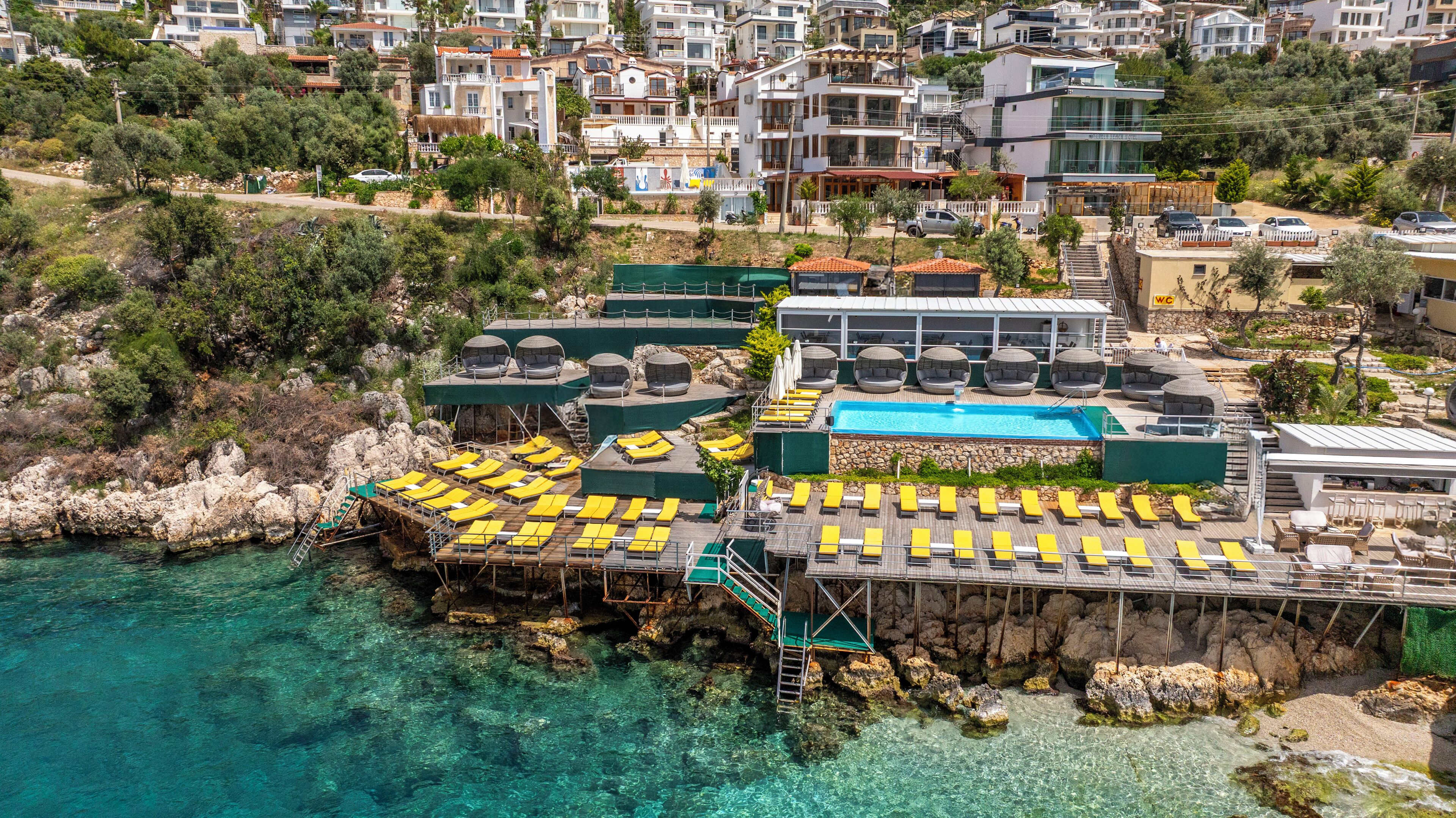 private beach, free beach cabanas, sun-loungers, beach umbrellas