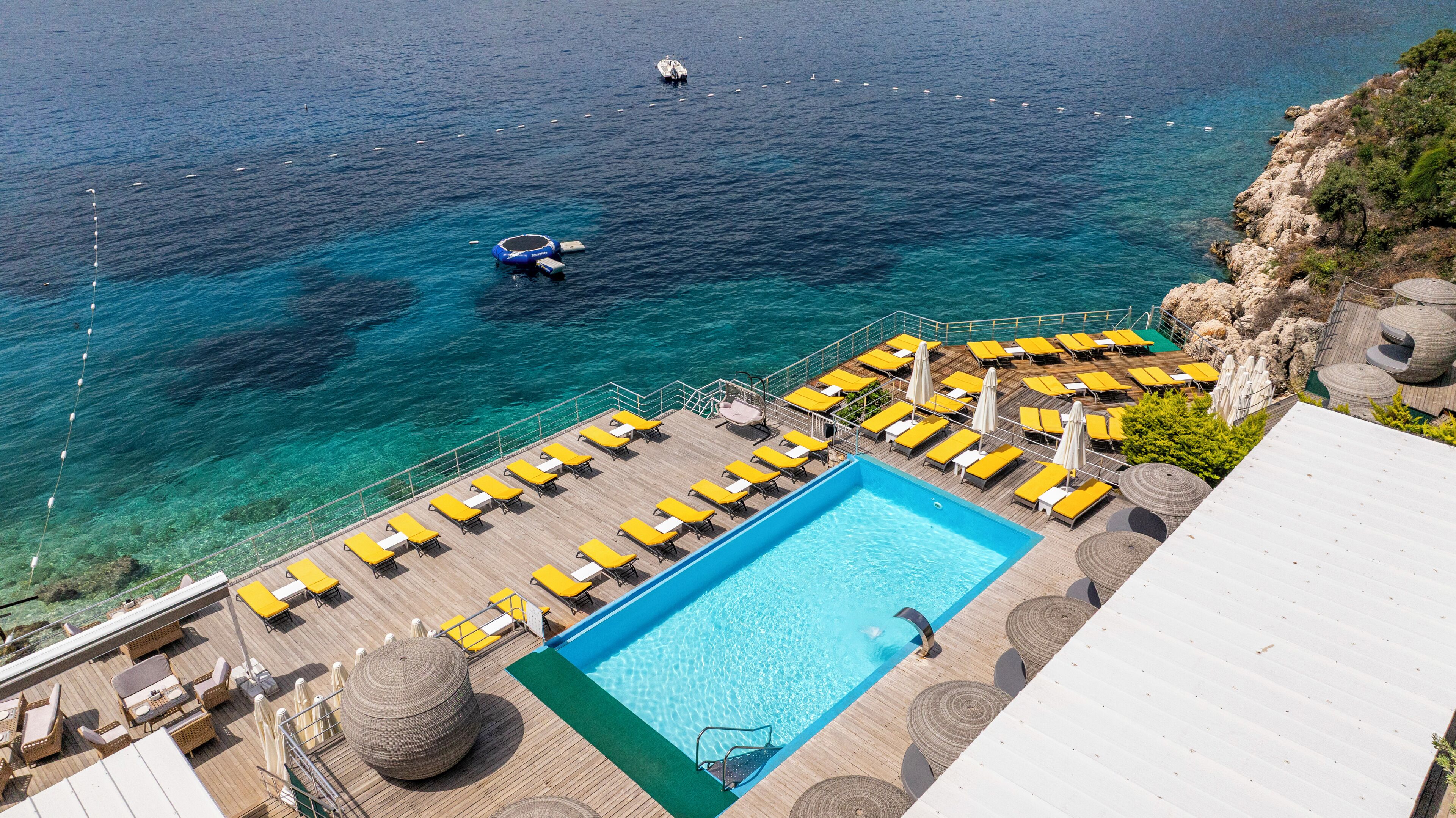 outdoor pool, pool umbrellas, pool loungers